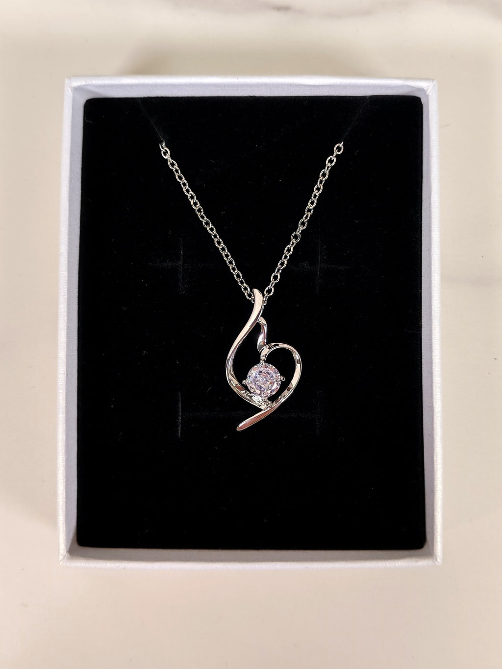 Collana Punto Luce con Pendente a Spirale e Zircone