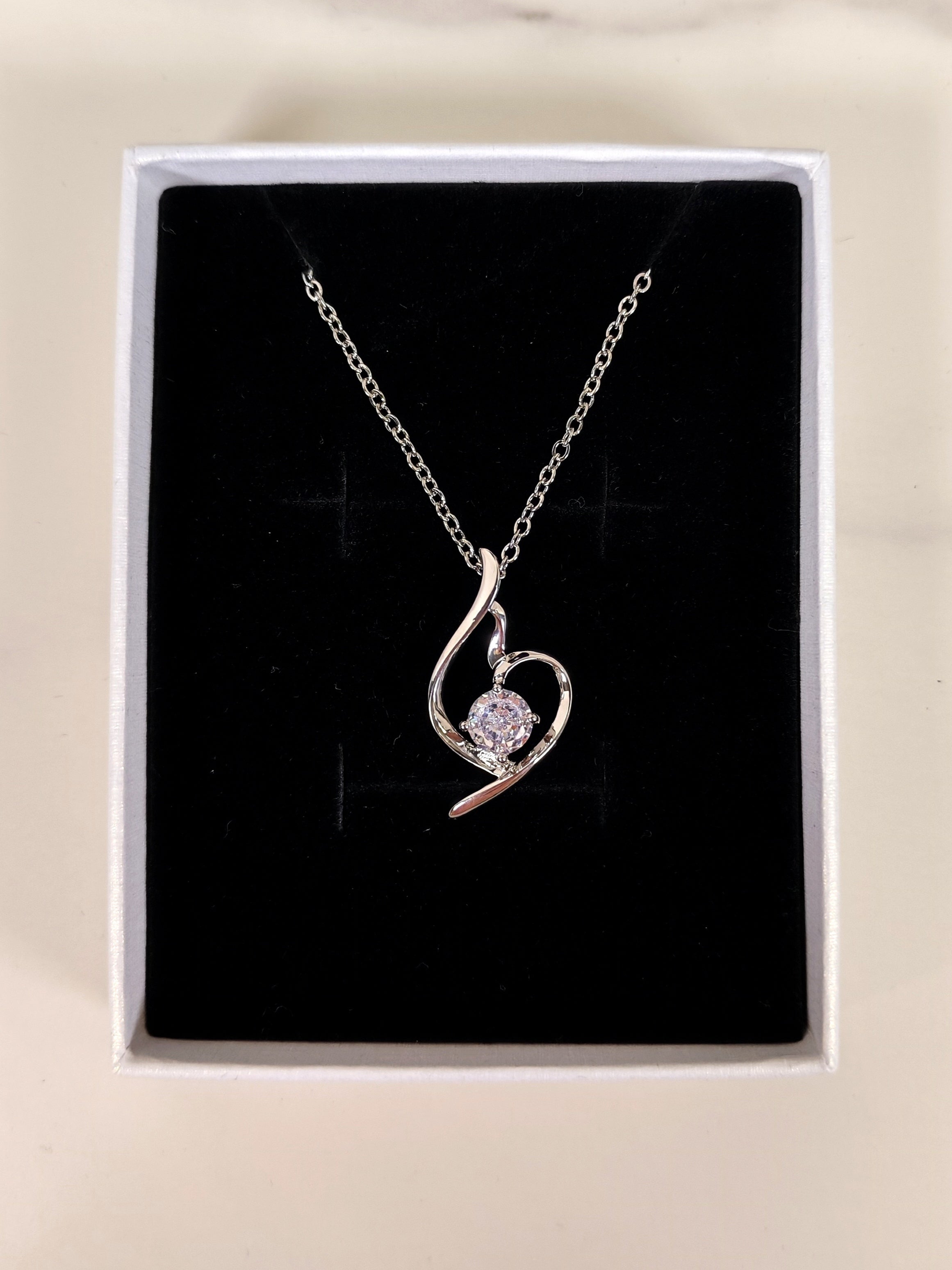 Collana Punto Luce con Pendente a Spirale e Zircone