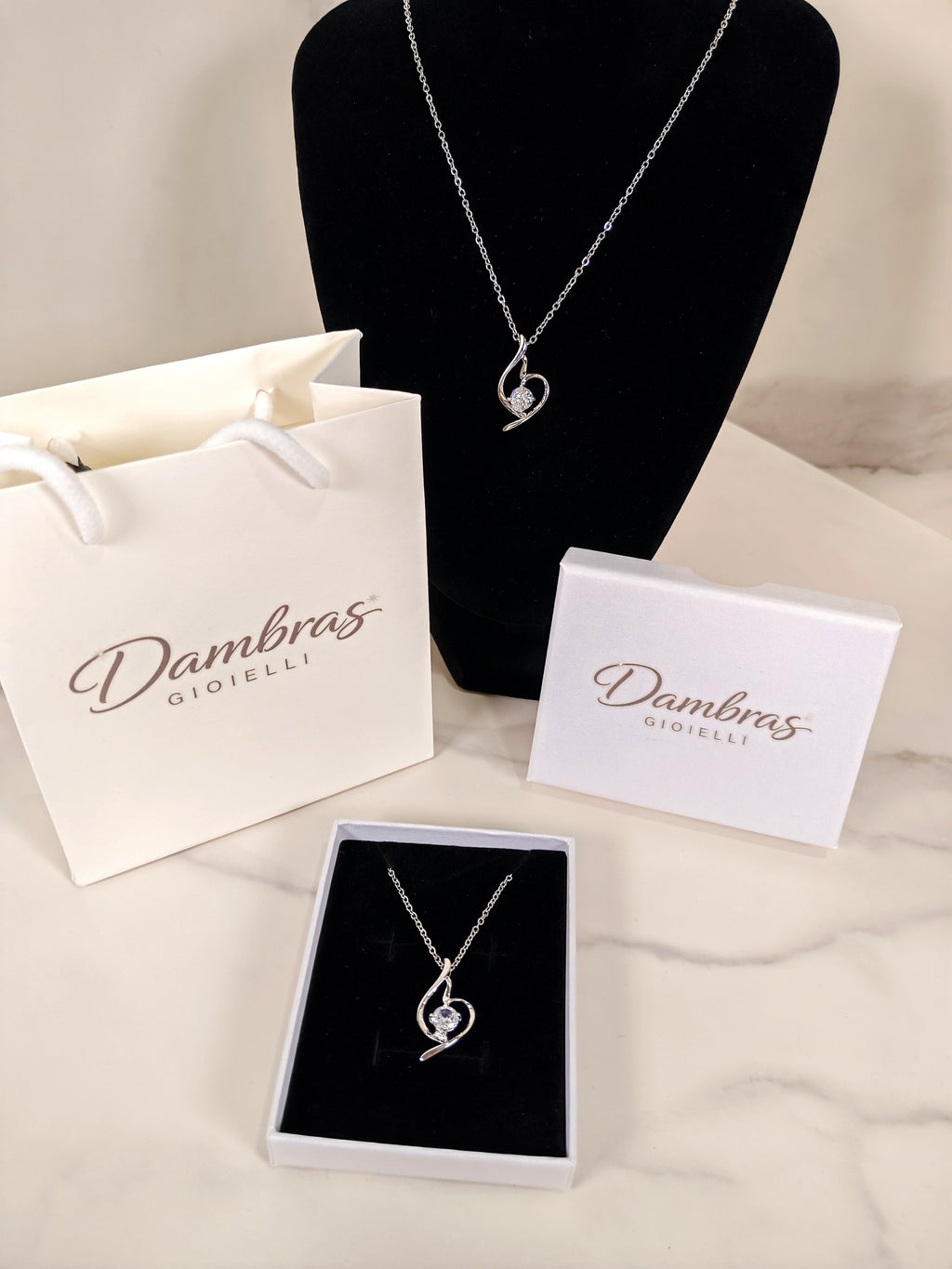 Collana Punto Luce con Pendente a Spirale e Zircone