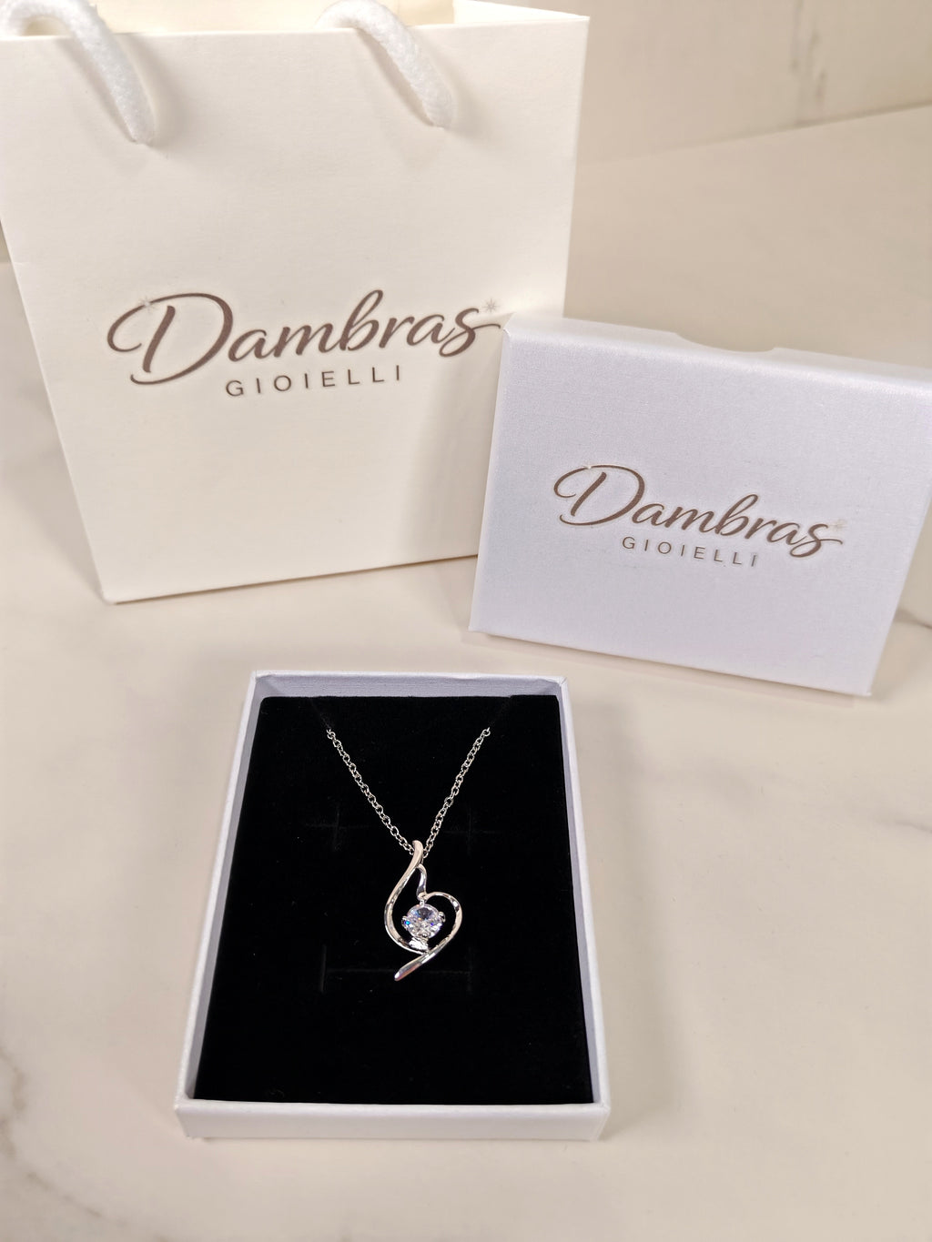 Collana Punto Luce con Pendente a Spirale e Zircone