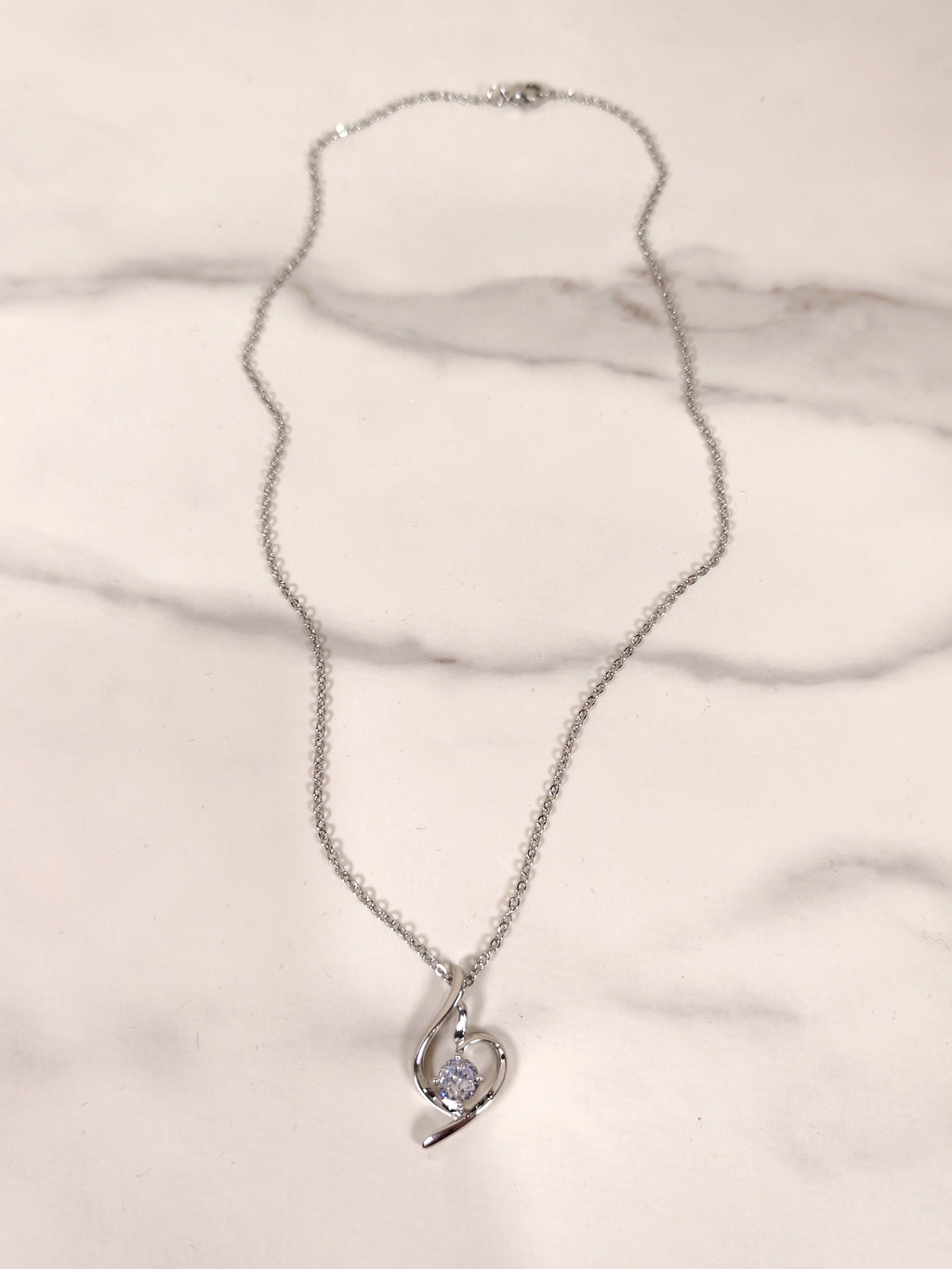 Collana Punto Luce con Pendente a Spirale e Zircone
