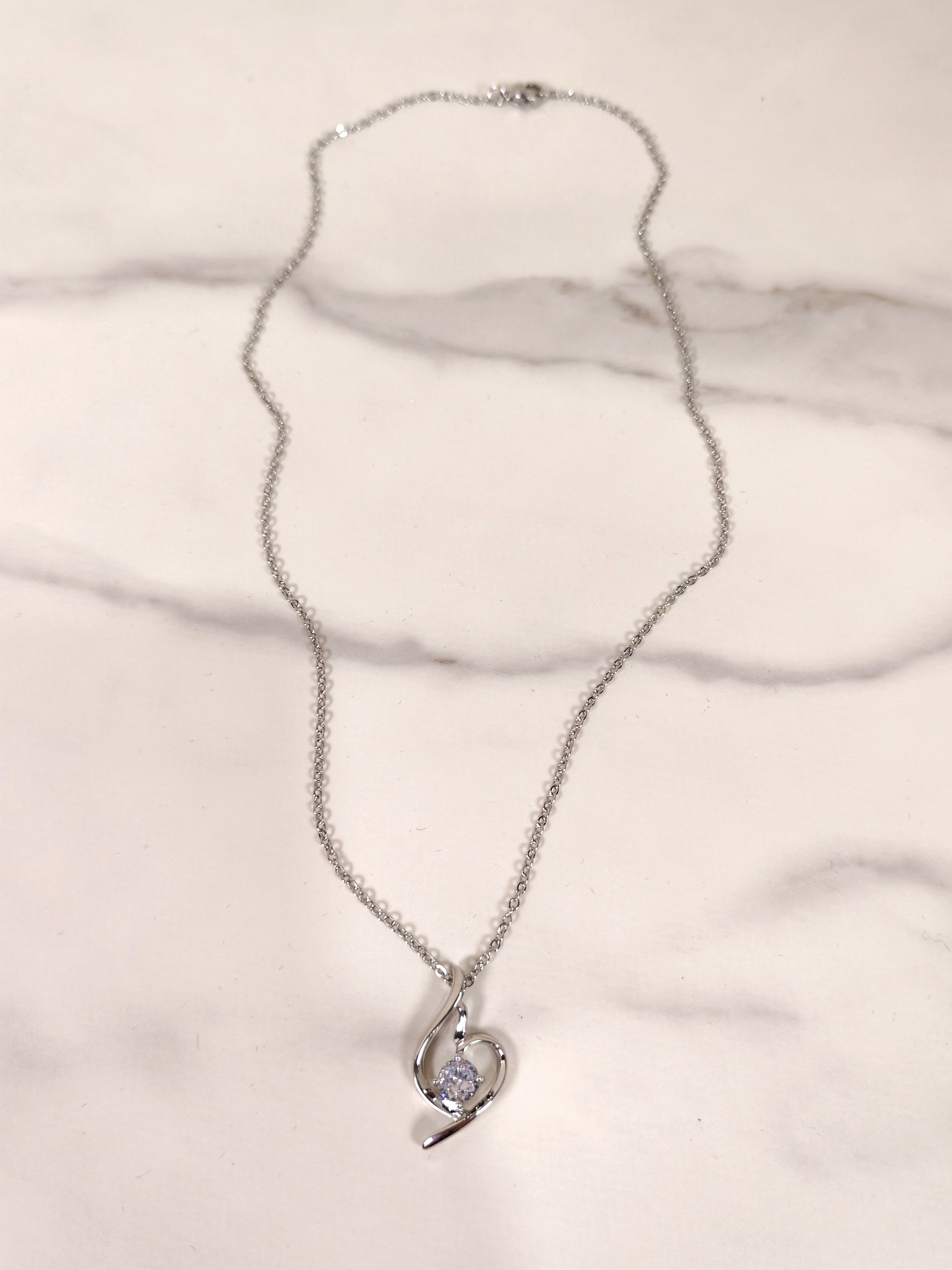 Collana Punto Luce con Pendente a Spirale e Zircone