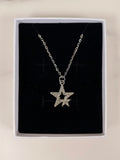 Collana Intreccio di Stelle con Zirconi Luminosi