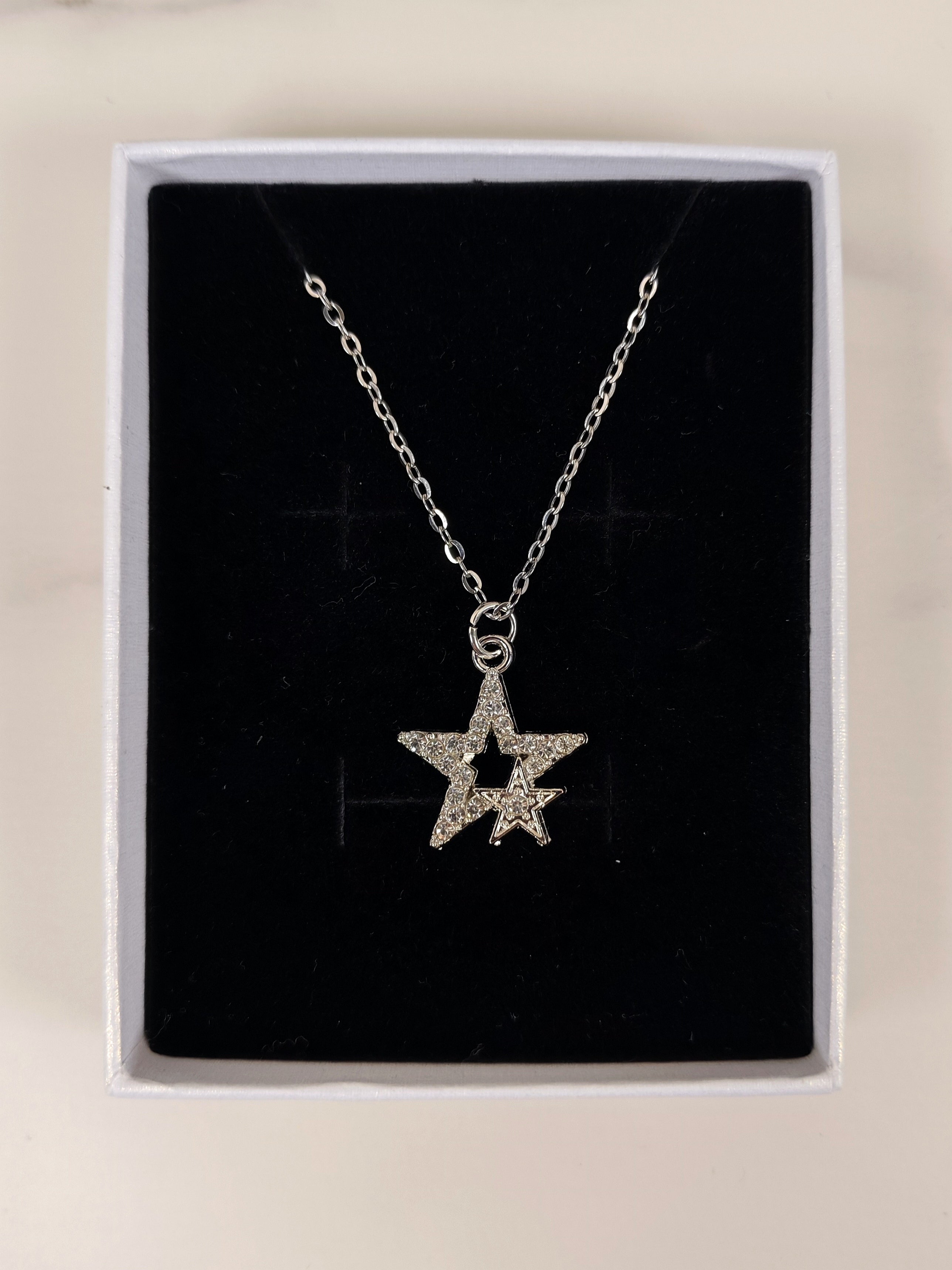Collana Intreccio di Stelle con Zirconi Luminosi