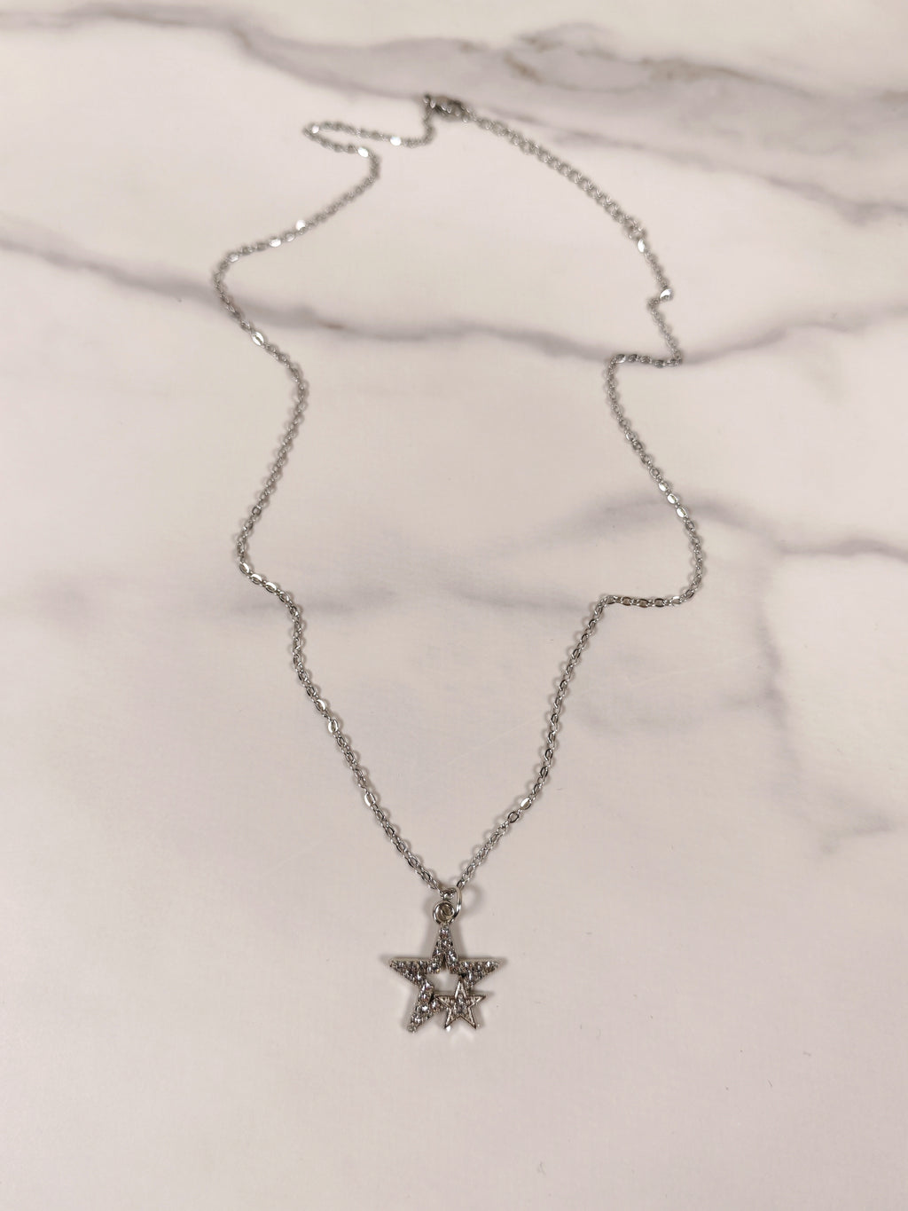 Collana Intreccio di Stelle con Zirconi Luminosi